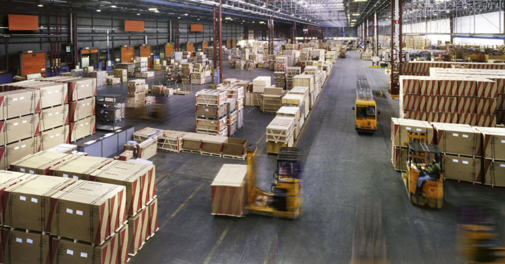 Active warehouse illustrating the operational and financial complexity of an inventory-based business