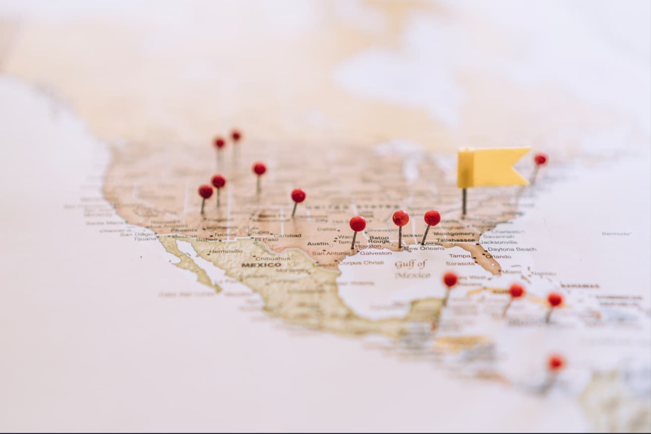 AB map of US with red headed Pins In It to mark specific locations